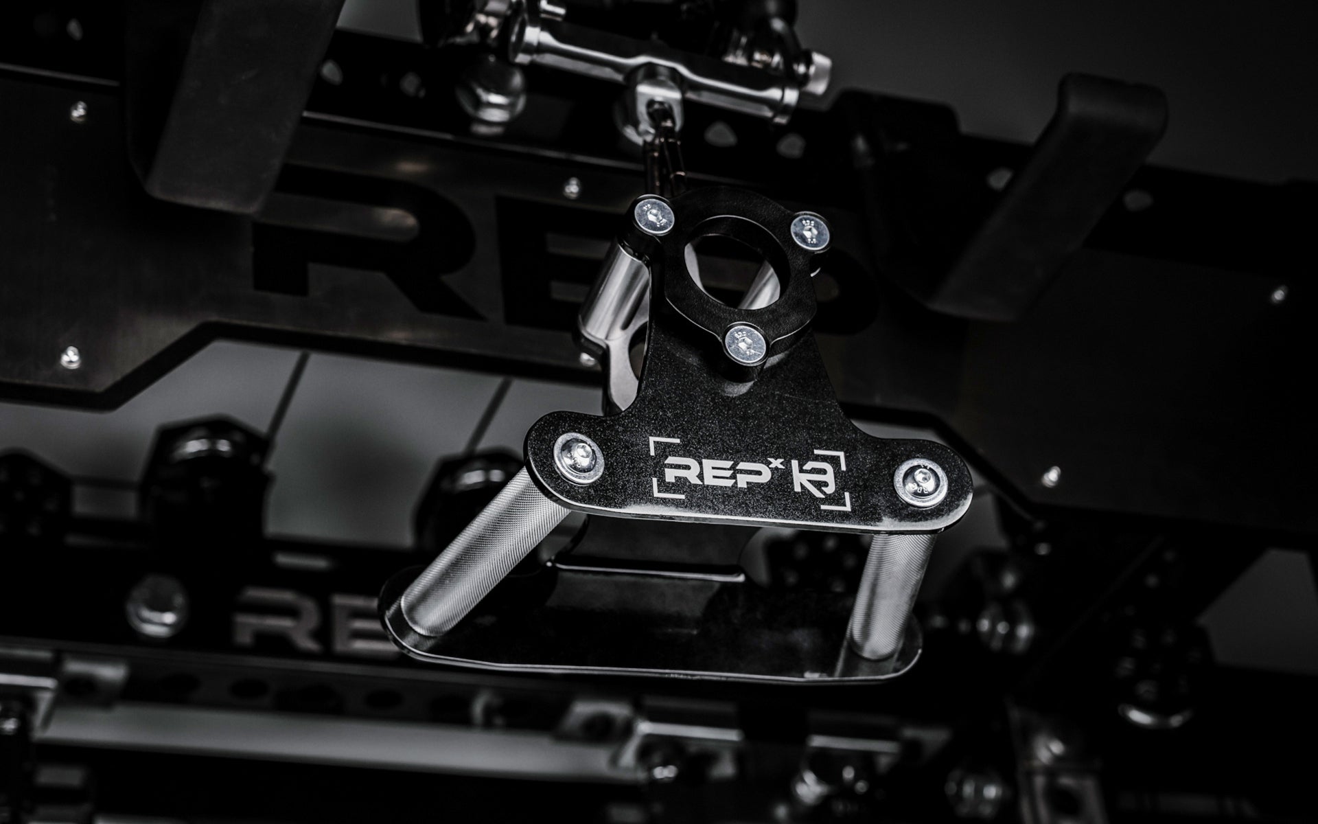 REP® x Kleva Built® Angled Atlas™ Close-Grip Cable and Landmine Attachment on the lat pulldown cable on an Ares™ 2.0