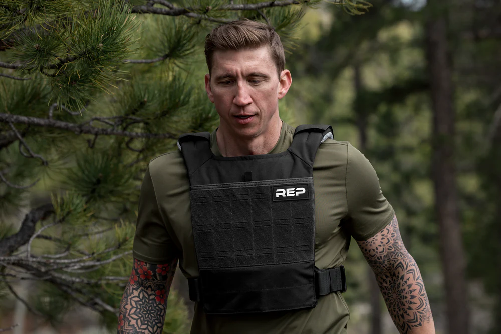 Athlete hikes with the Strata™ Weight Vest.