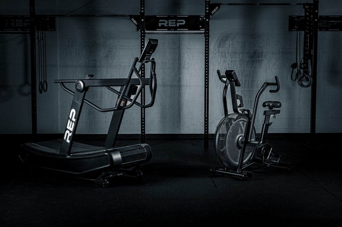 The Strive™ Air Bike and Curved Tread in the REP gym.
