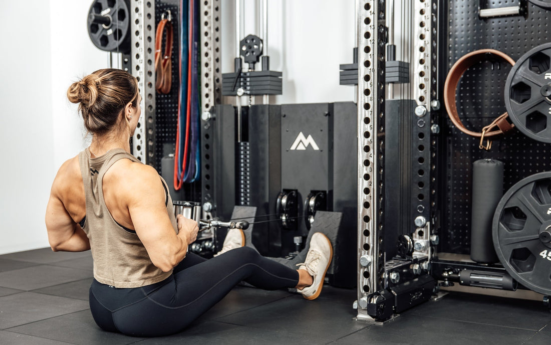 Athlete does a low row on the Ares™ 2.0.